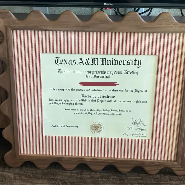 Customer photo of a diploma in a walnut Elise scallop frame